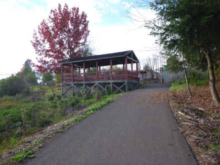 Paved surface – wetlands preserve to north view parking lot – end of trail – shelter – gate closed when flooded